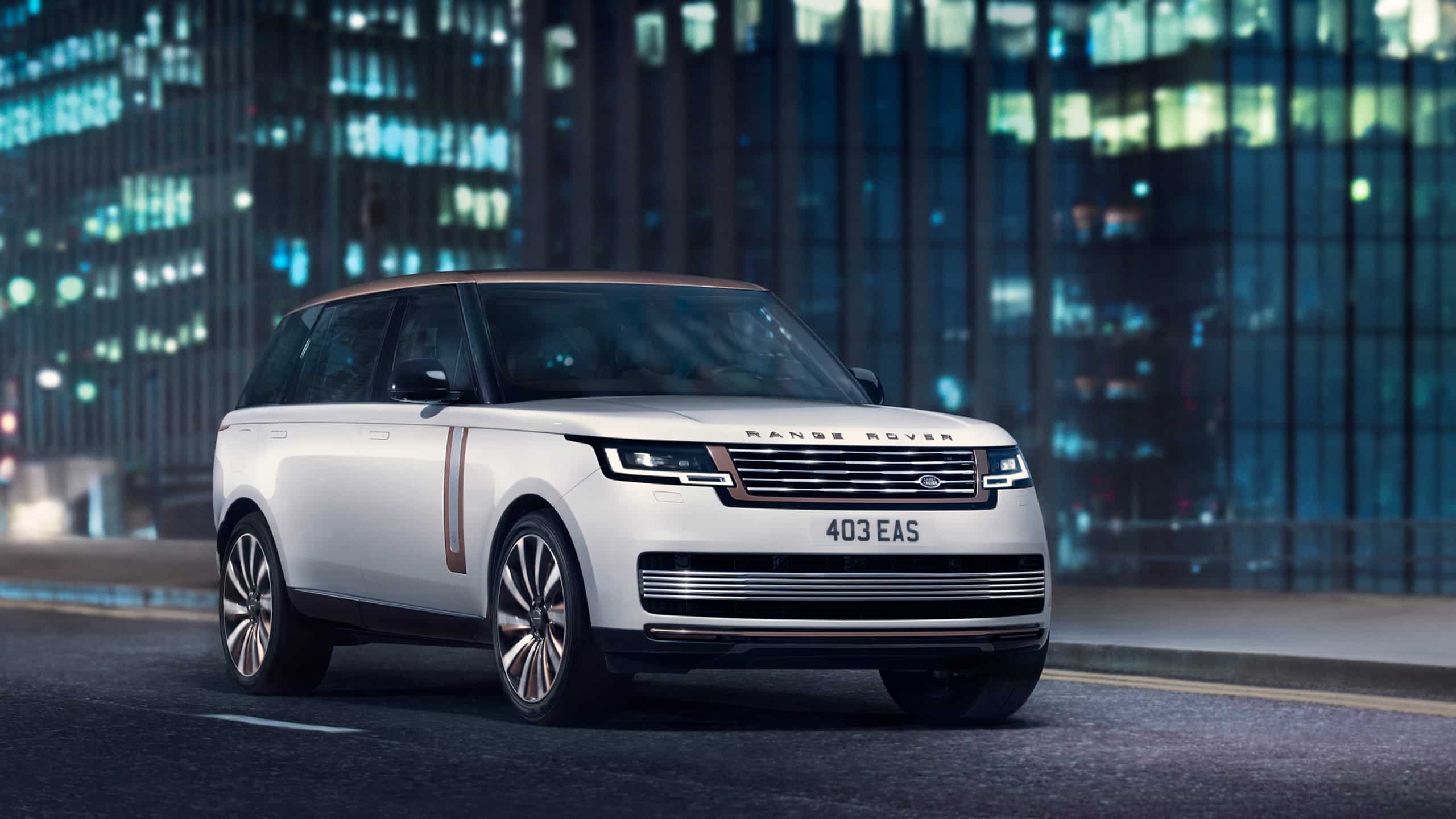 Range Rover driving on city road