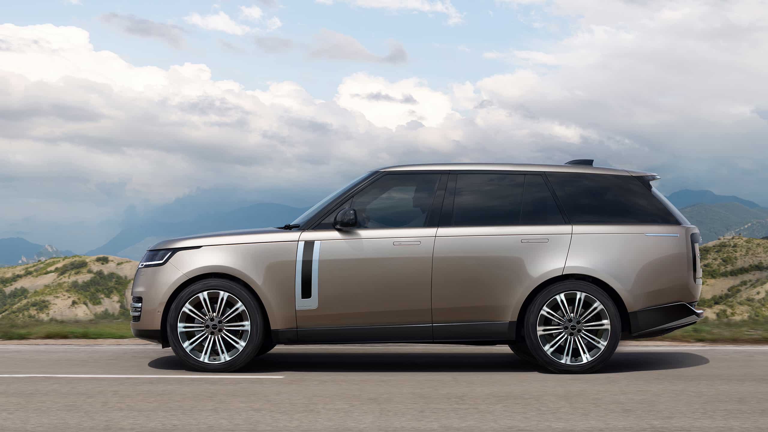 Range Rover driving on road