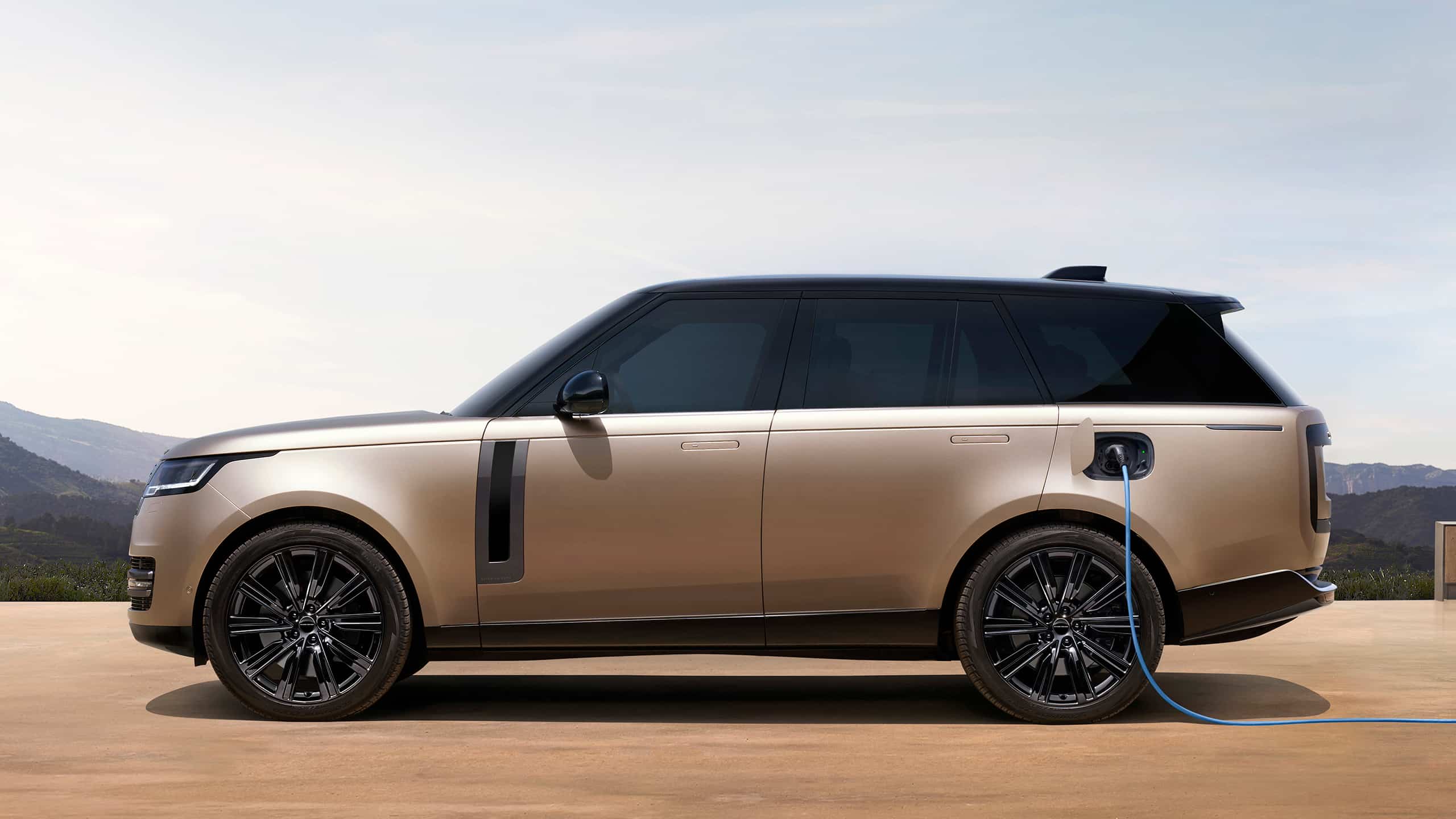 Range Rover parked at EV station