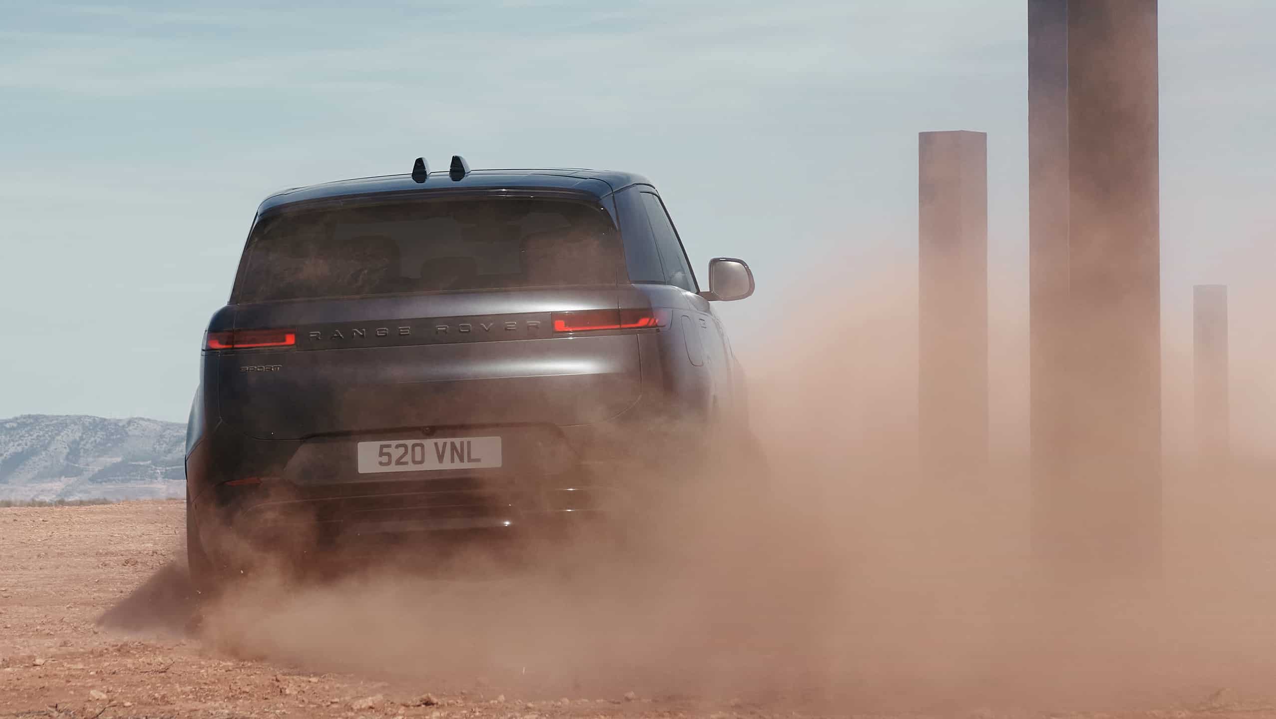 Range Rover Sports drifting on sand dust road
