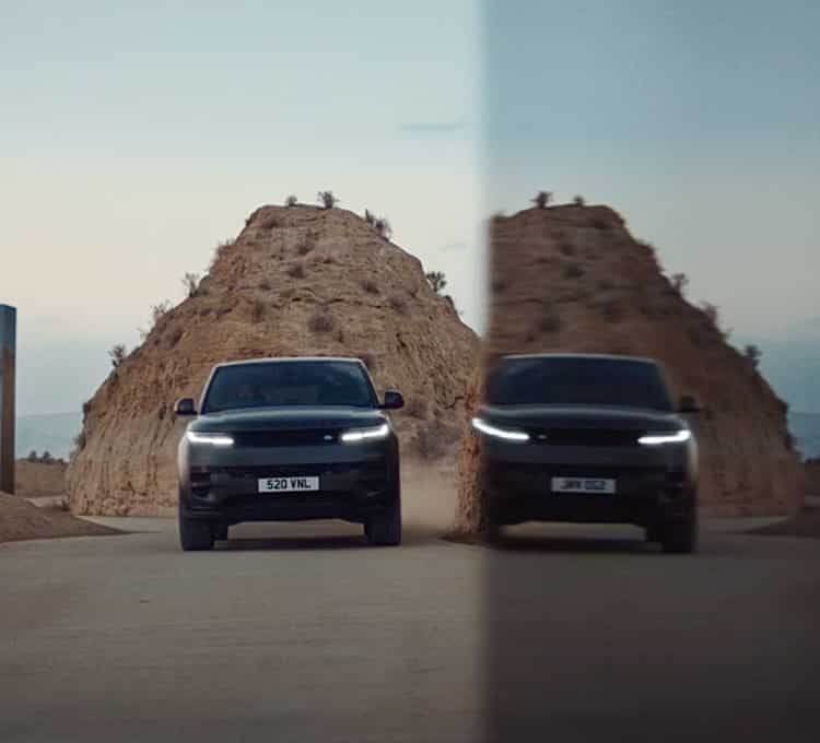 Range Rover Sports driving on road