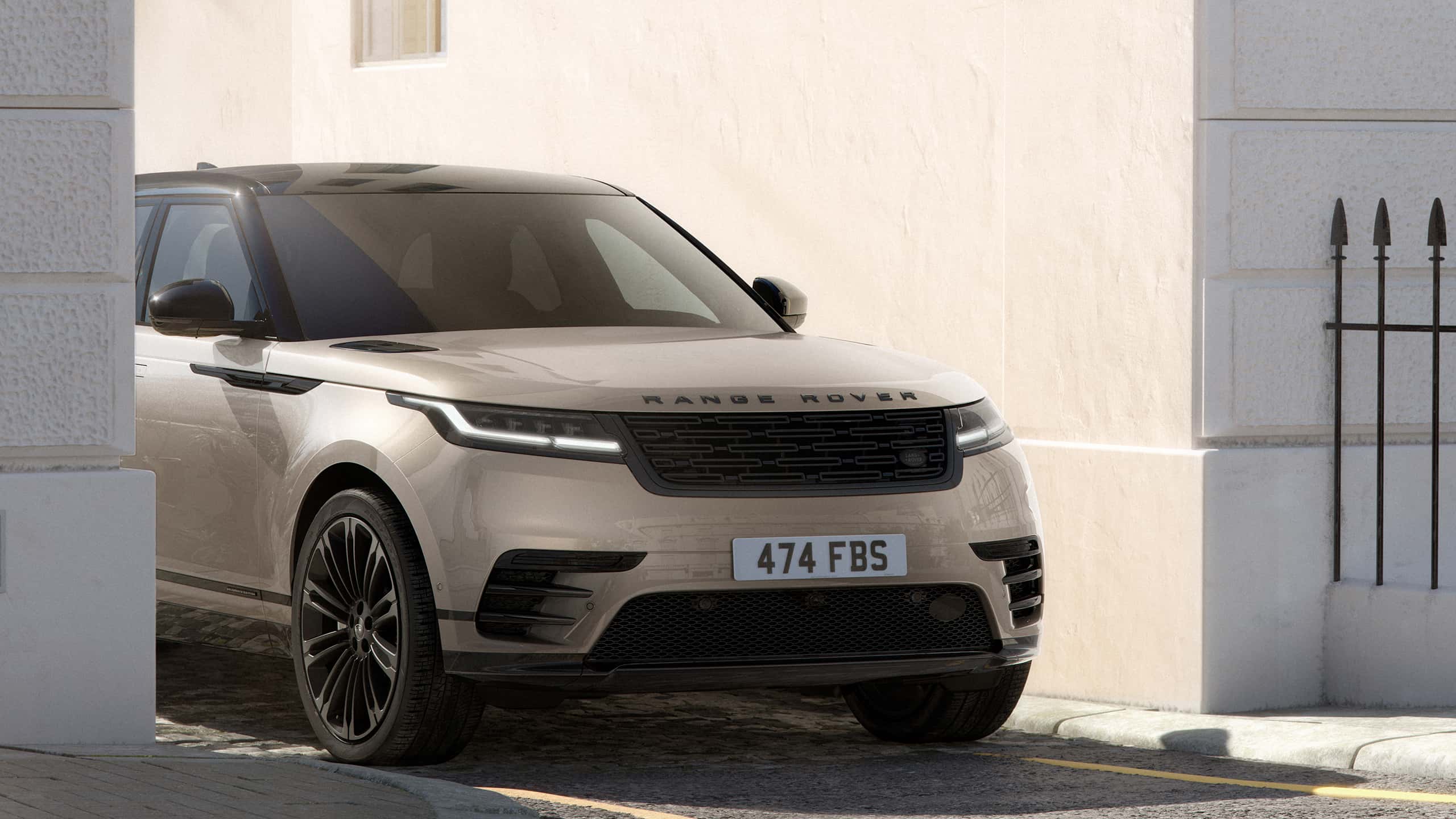 Range Rover Velllar driving on road